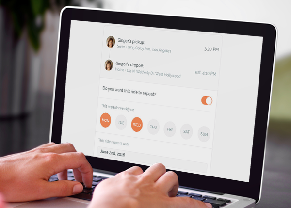 Close-up of hands typing on laptop showing a ride scheduling interface with pickup and dropoff locations and weekly calendar